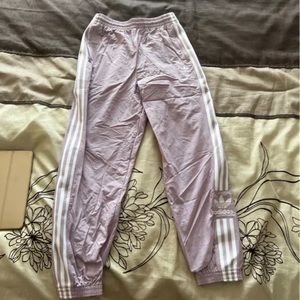 Purple Adidas track pants